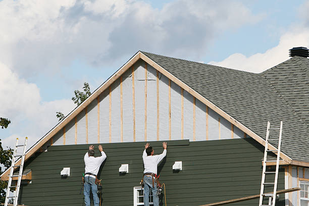 Professional Siding technician working in Stevensville, MD